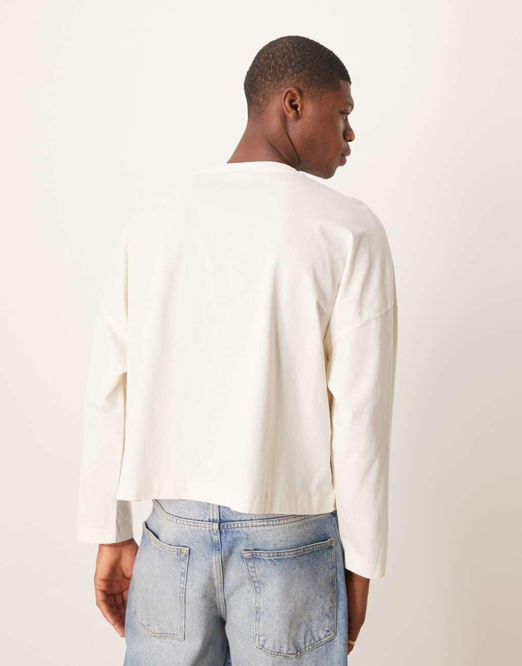 ASOS DESIGN super oversized cropped long sleeve t-shirt with henley neck in ecru Product Image