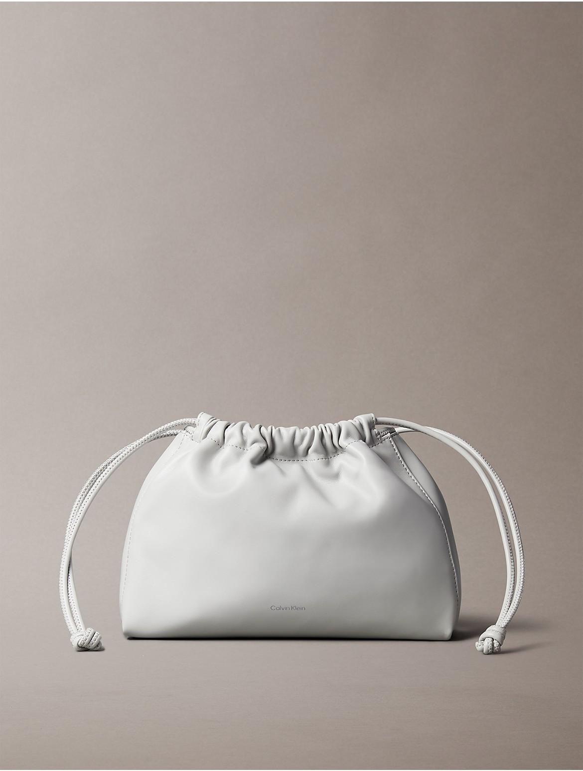 Calvin Klein Women's Drawstring Crossbody Bag - Pink Product Image