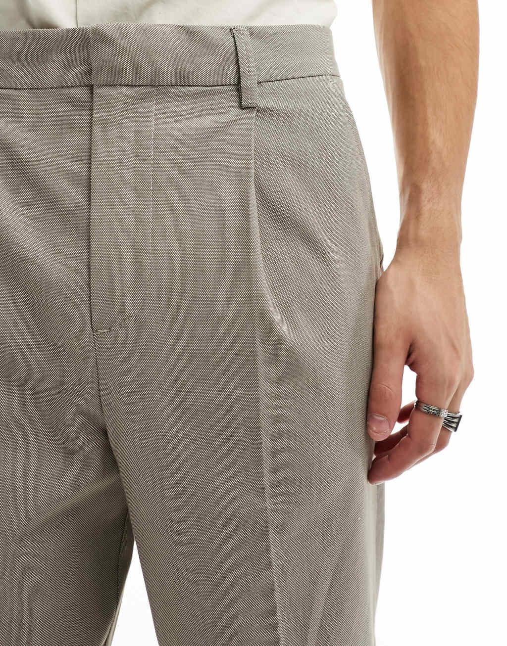 Selected Homme loose fit cropped pleat pants in beige Product Image