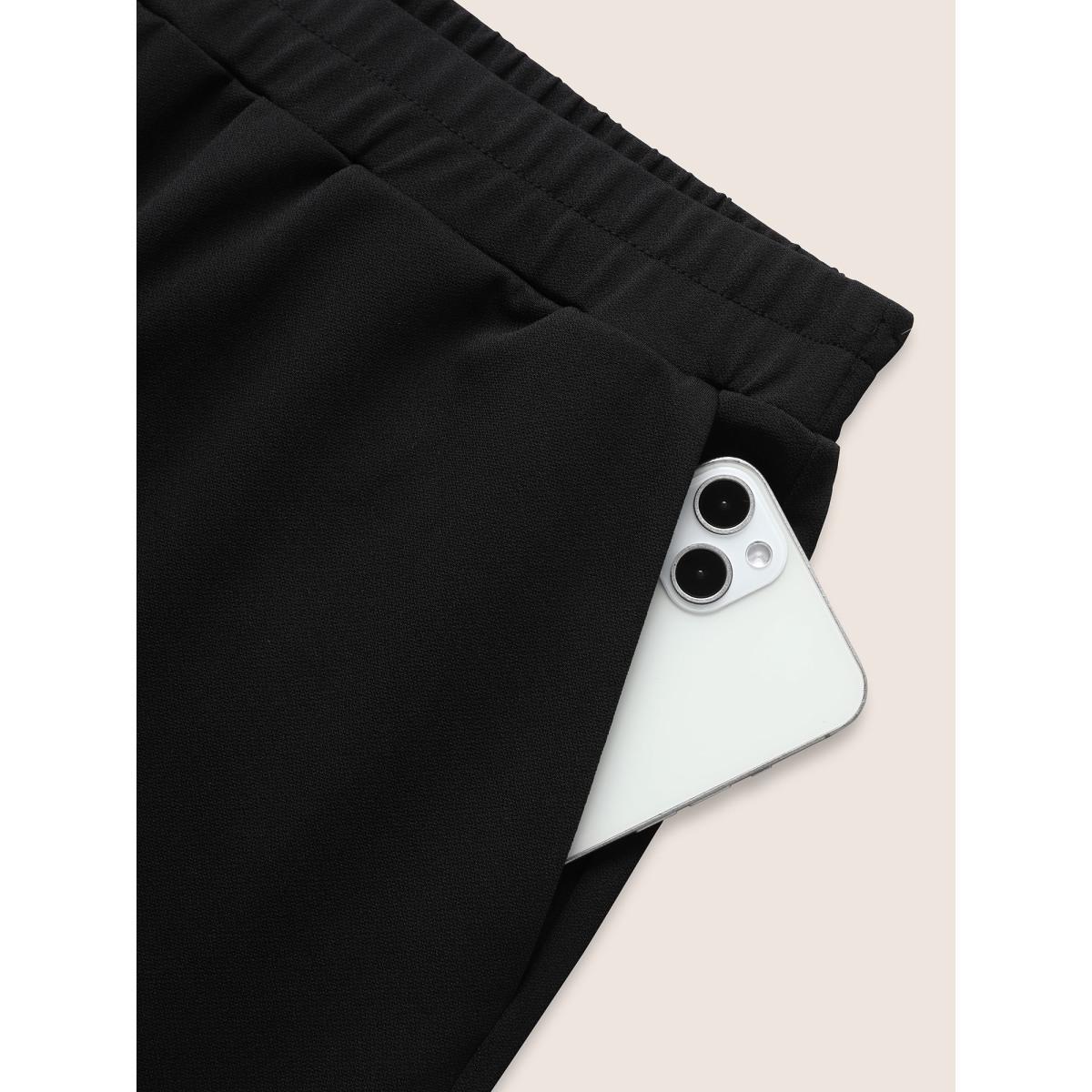 Plus Size Medium stretch Laser Cut Elastic Waist Pants Women Black Elegant Wide Leg Mid Rise Everyday Pants BloomChic 12/L Product Image