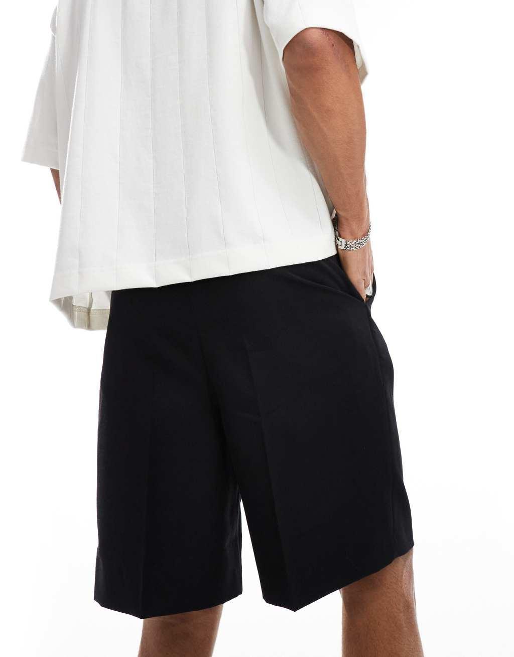 ASOS DESIGN dressy wide leg shorts in black Product Image