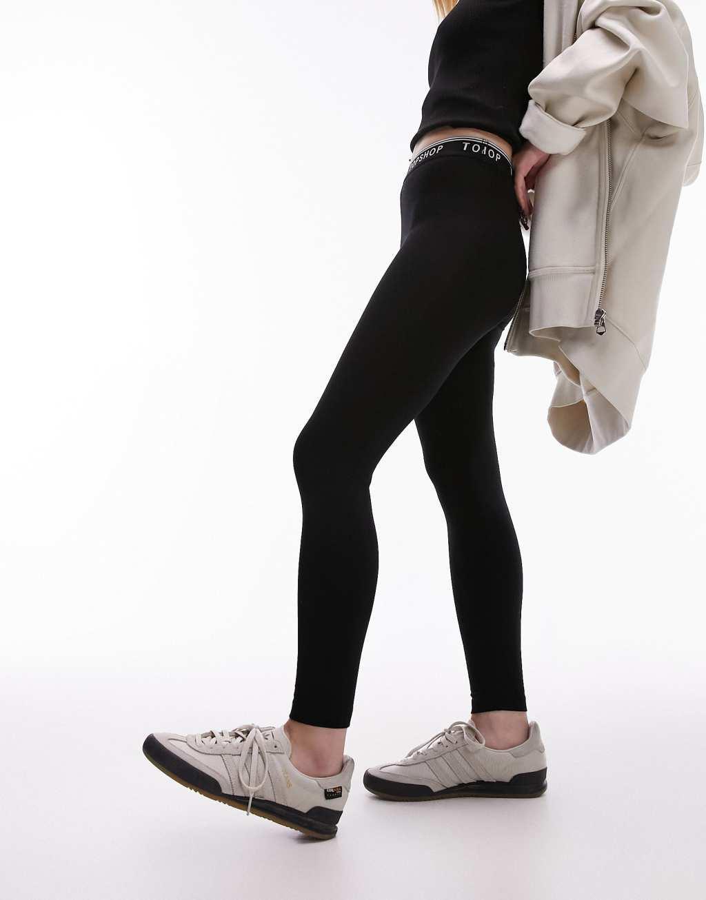Topshop Petite branded elastic legging in black Product Image