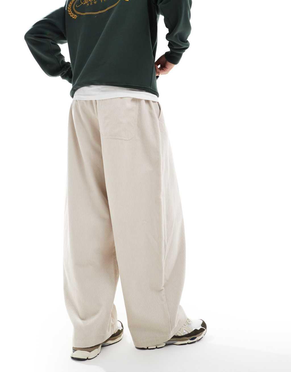 ASOS DESIGN baggy parachute cord pants in cream Product Image