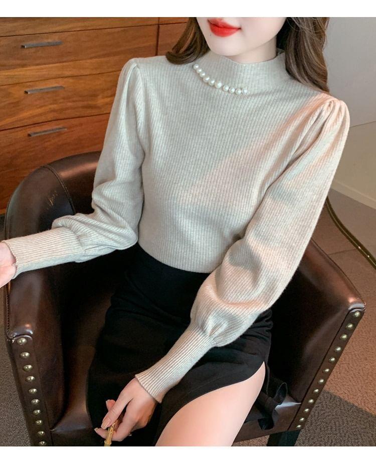 Long-Sleeve Mock Neck Plain Faux Pearl Accent Ribbed Knit Top Product Image