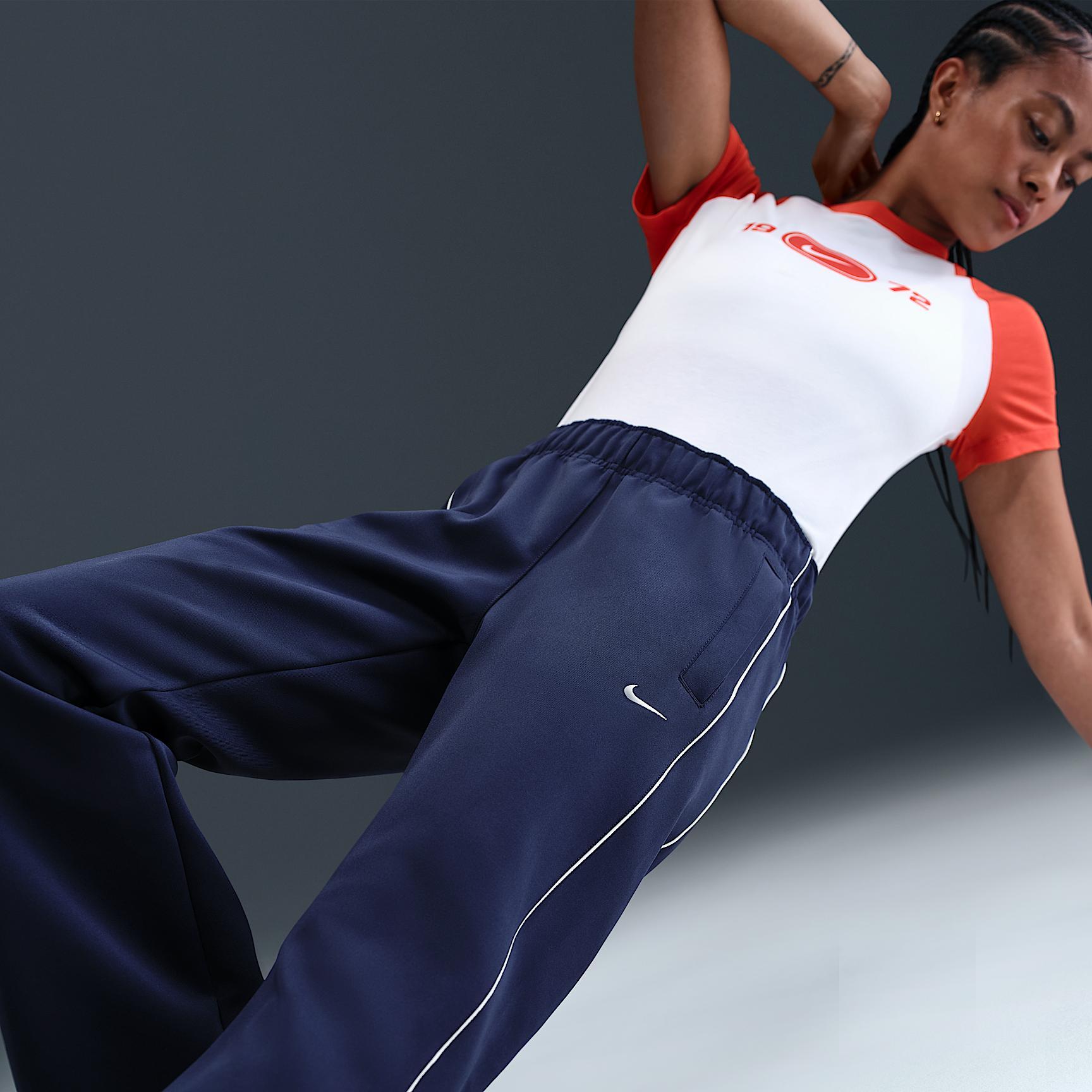 Women's Nike Sportswear Windrunner Mid-Rise Slim Knit Pants Product Image