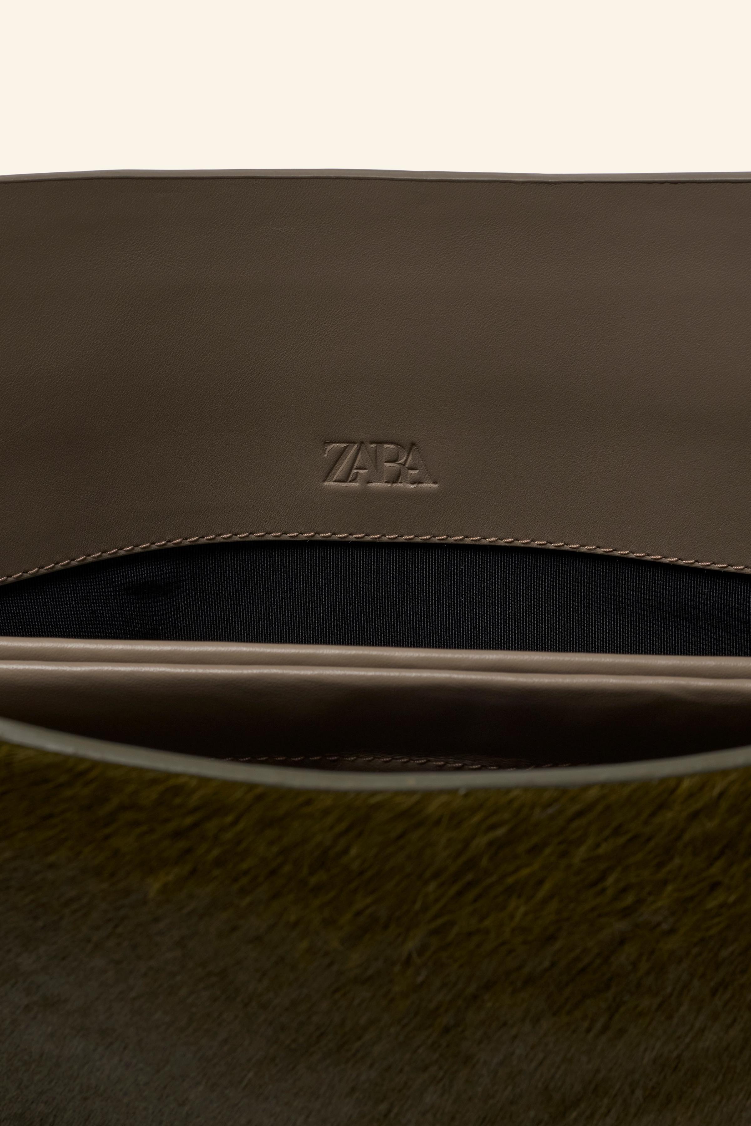 LEATHER CLUTCH LIMITED EDITION Product Image