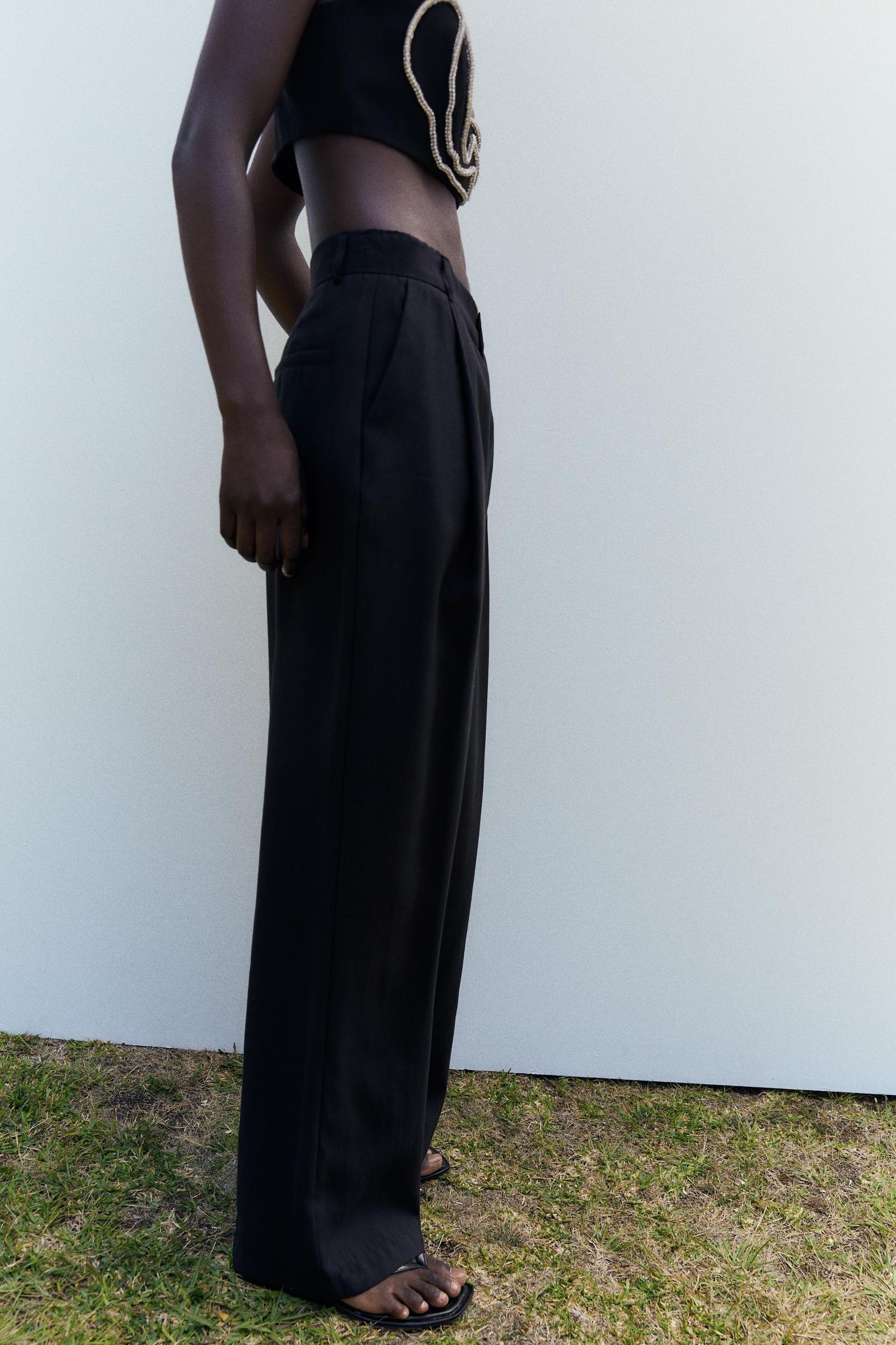 FLOWY PLEATED PANTS Product Image