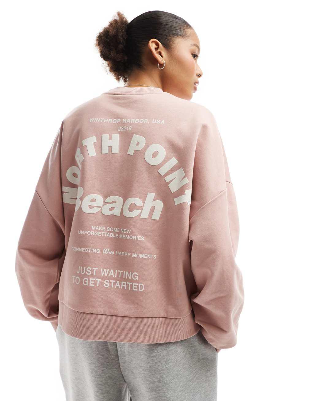 Bershka graphic sweater in dusty pink Product Image