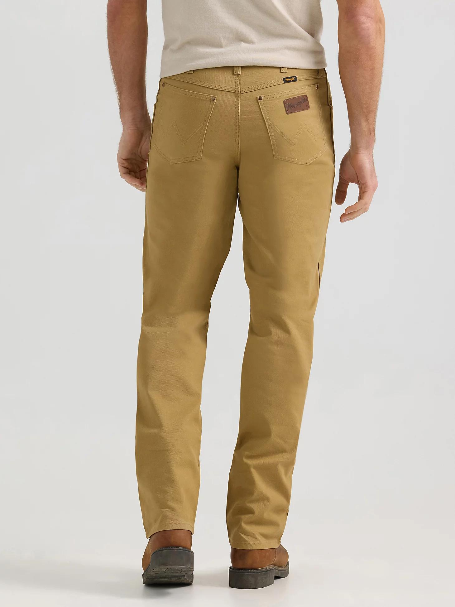 Premium Performance Tough Comfort Cowboy Cut® Regular Fit Canvas Jean | Men's JEANS | Wrangler® Product Image