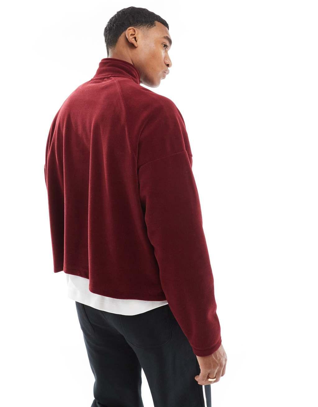 ASOS DESIGN oversized quarter zip fleece sweatshirt in burgundy Product Image