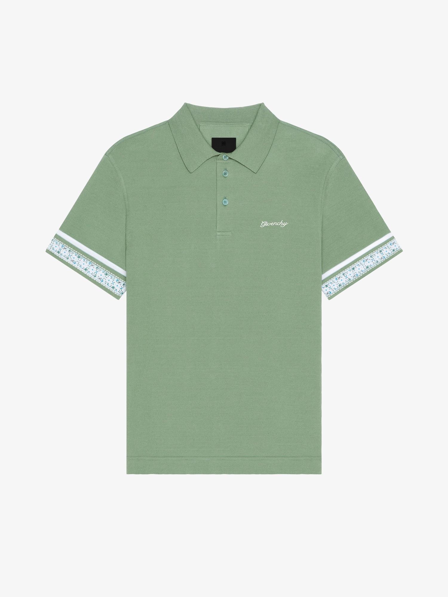 Polo in cotton with floral detail Product Image