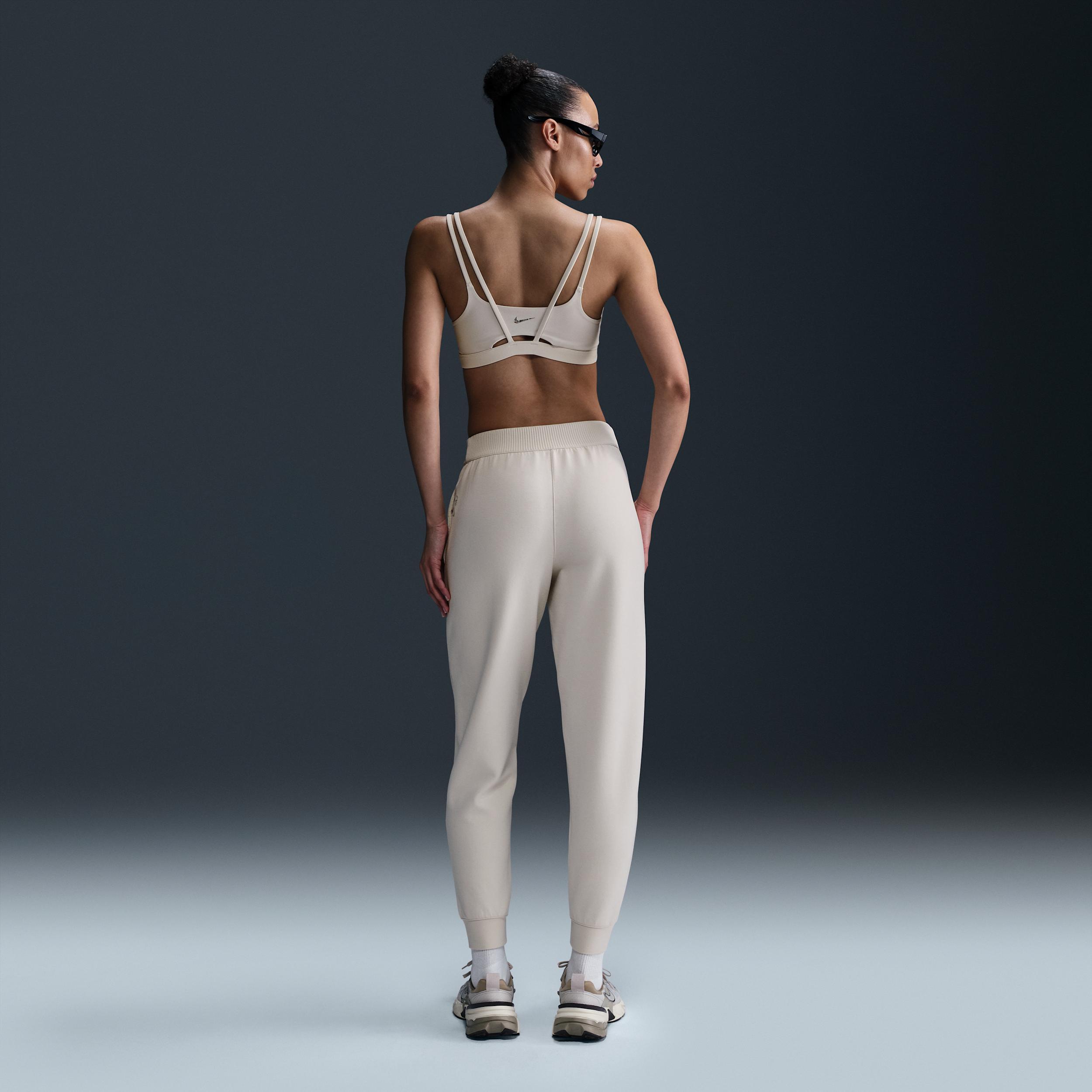 Nike Women's 24.7 ImpossiblySoft Dri-FIT Mid-Rise Jogger Pants Product Image