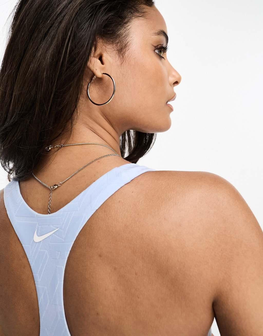 Nike Swimming Icon cutout bikini top in blue Product Image
