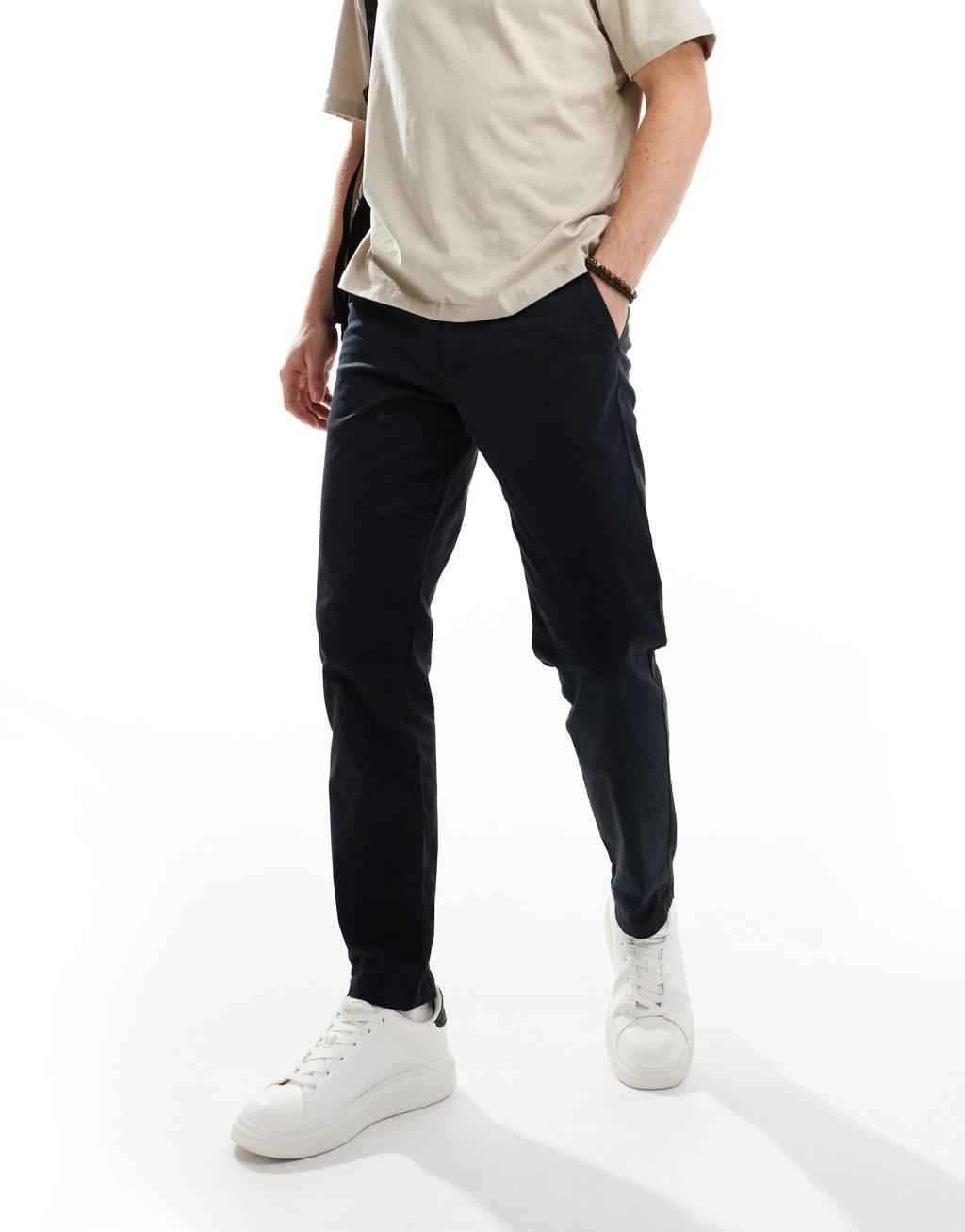 ASOS DESIGN tapered chinos in black Product Image