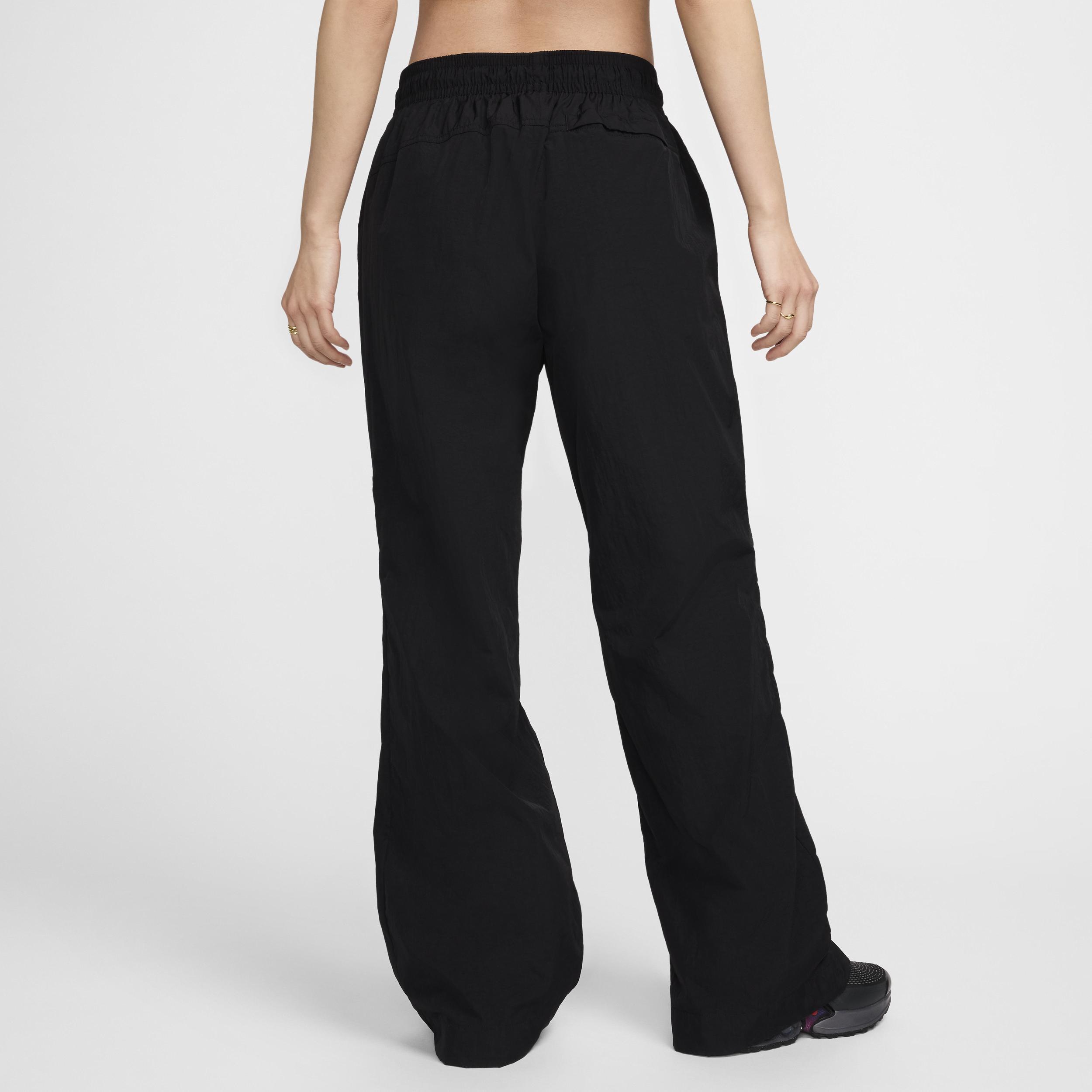 Women's Nike Sportswear Collection Mid-Rise Repel Zip Pants Product Image