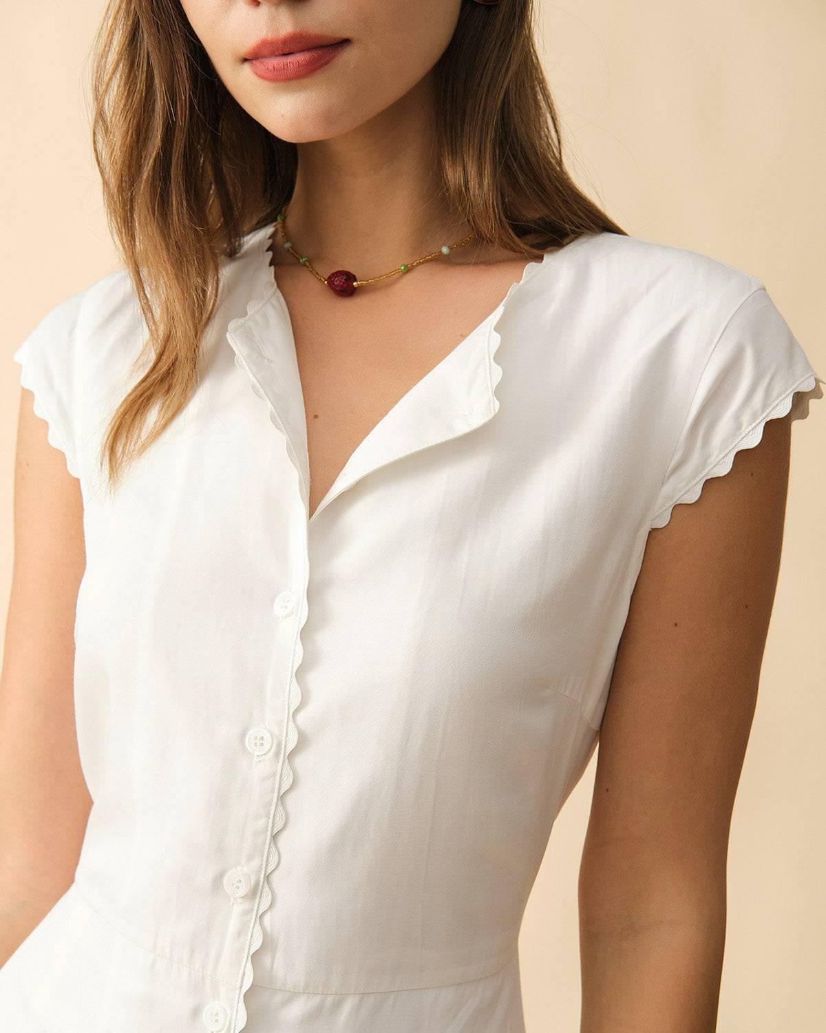 The Solid Color Lapel Midi Dress Female Product Image