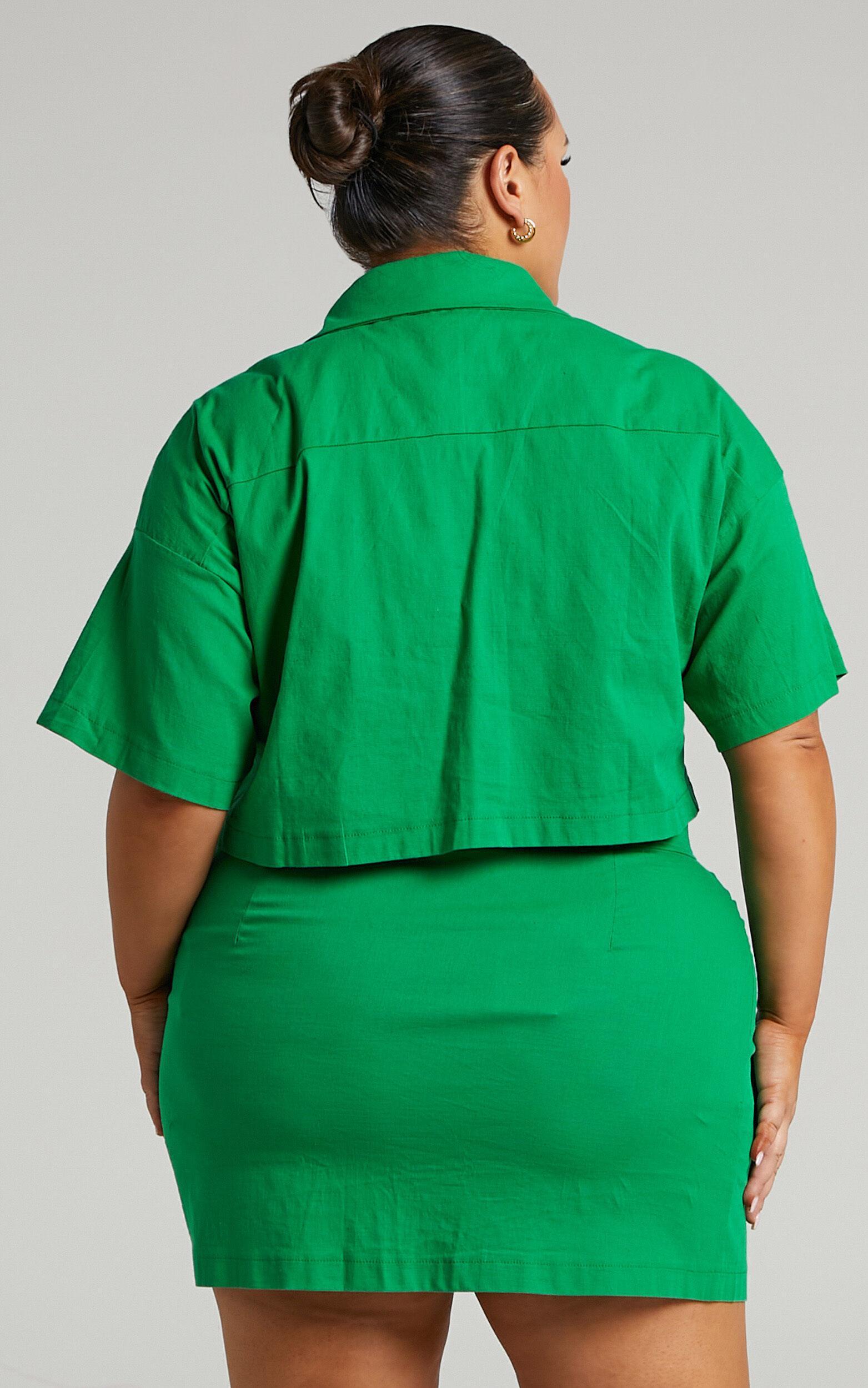 Navine Two Piece Set - Button Front Crop Top and Cargo Pocket Mini Skirt Set in Green Product Image