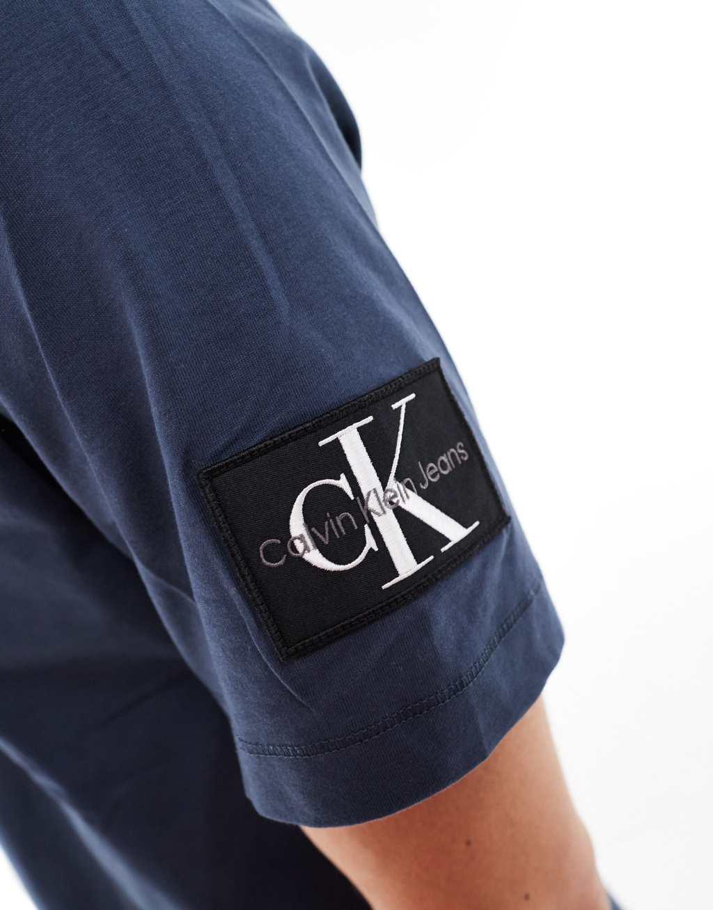 Calvin Klein Jeans badge T-shirt in navy Product Image