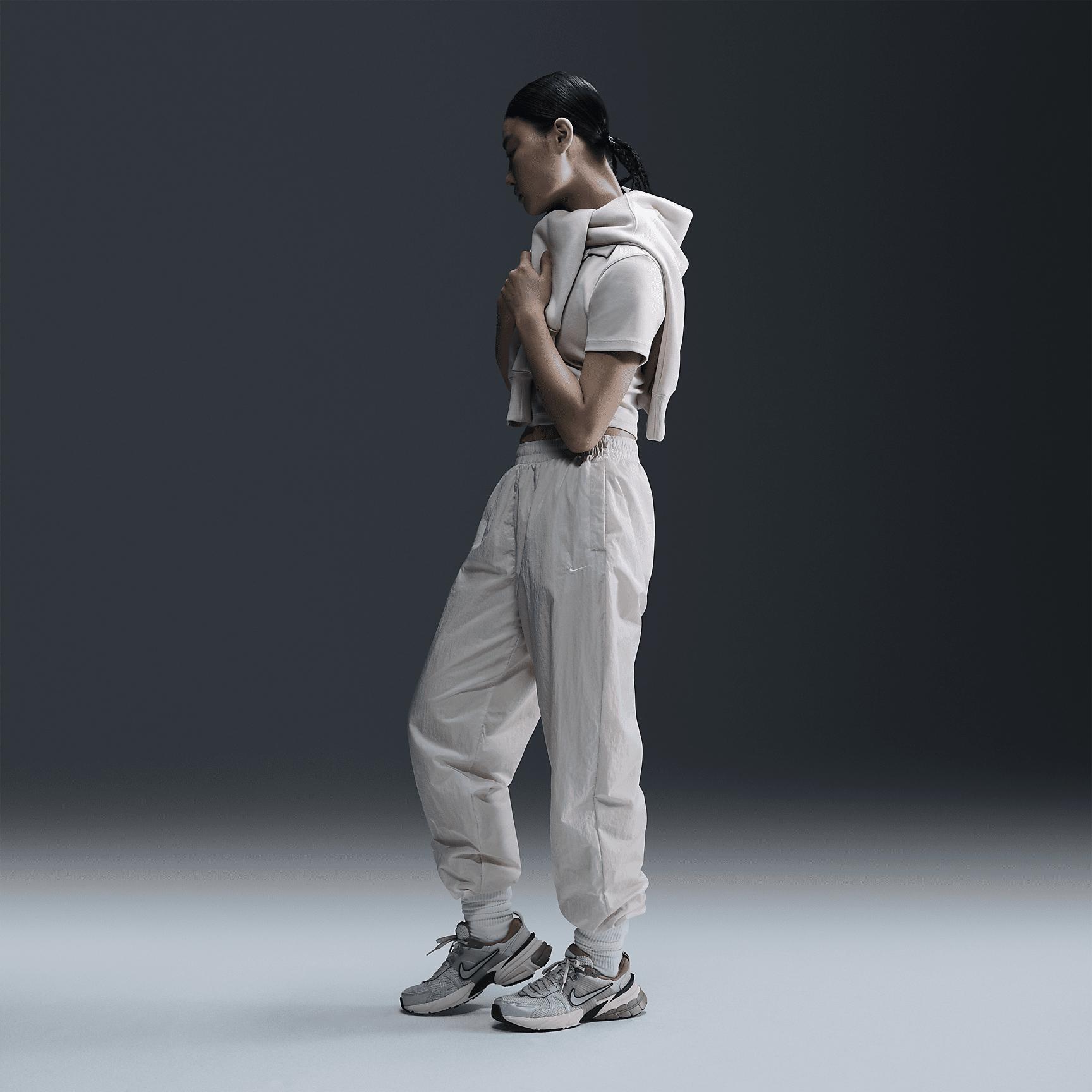Women's Nike Sportswear Essential Mid-Rise Oversized Woven Jogger Pants Product Image