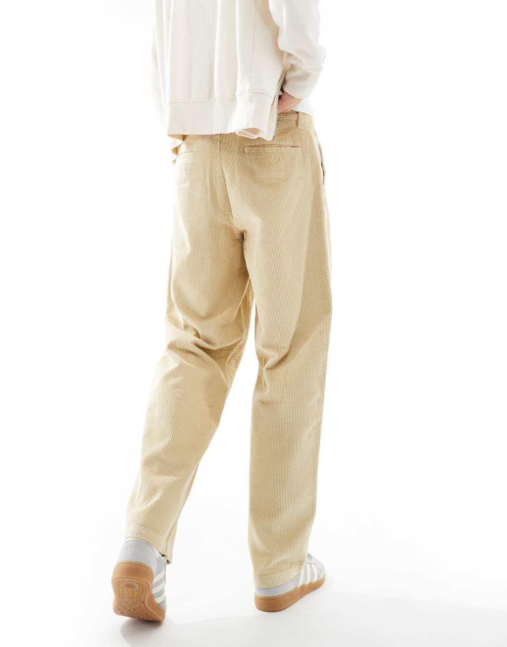 ASOS DESIGN baggy fit corduroy pants in stone Product Image