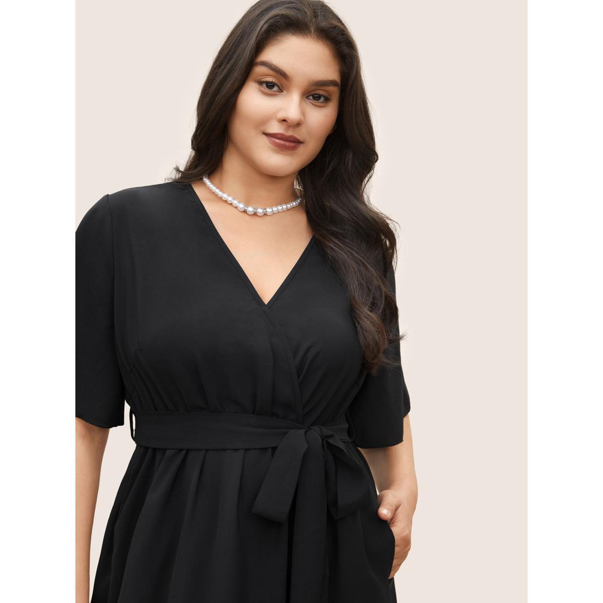 Plus Size Bloom Dress - Solid Tie Surplice Ruffle High Low Dress Black Women Elegant Cross straps V-neck Short sleeve Curvy Midi Dress BloomChic 16/1X Product Image