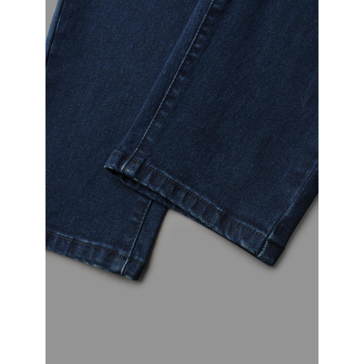 Plus Size Booty-Lifting Skinny Fit Mid-Rise Jeans Women Denimindigo Elegant Button Medium stretch Slanted pocket Jeans BloomChic 12/L Product Image