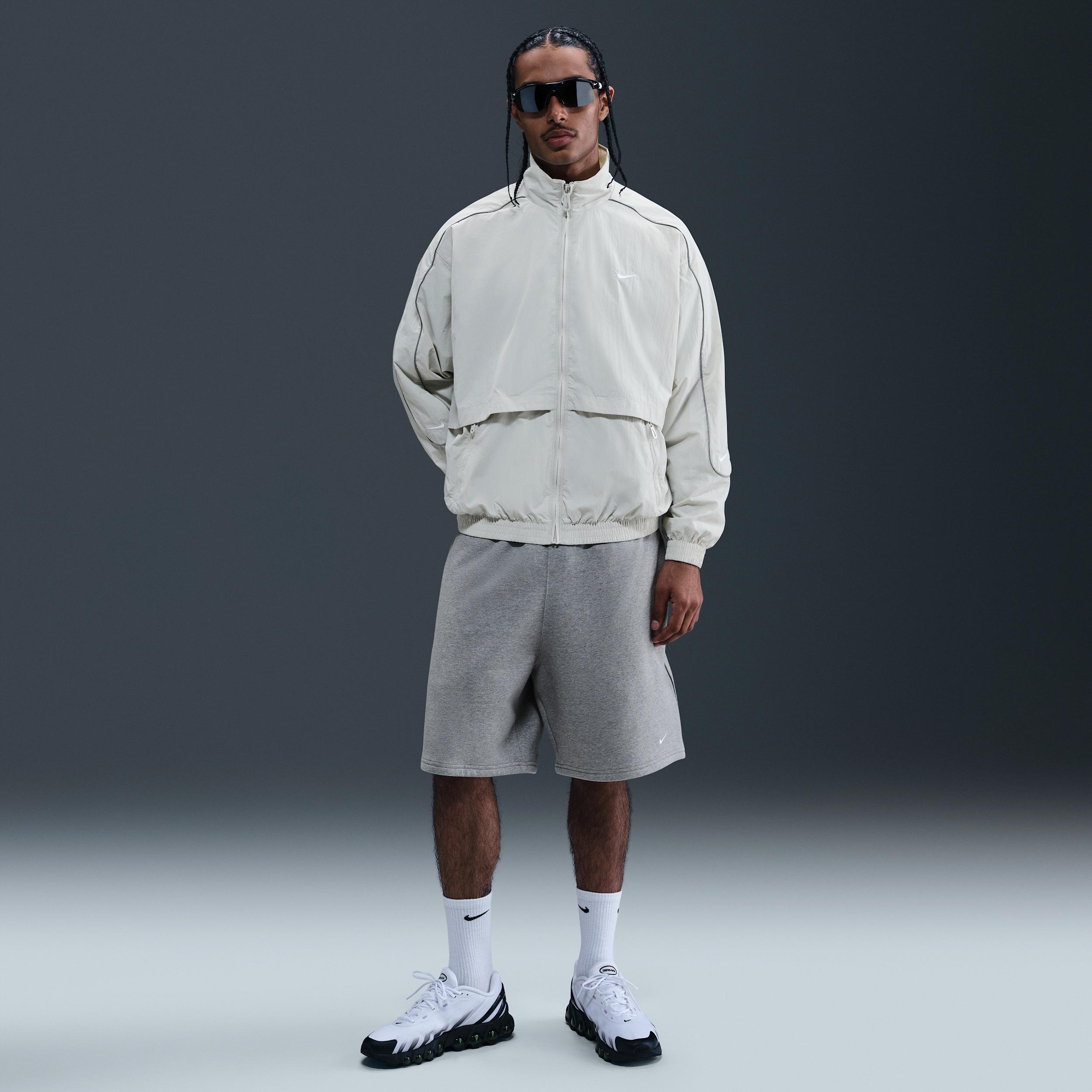 Men's Nike Sportswear Solo Swoosh Woven Track Jacket Product Image