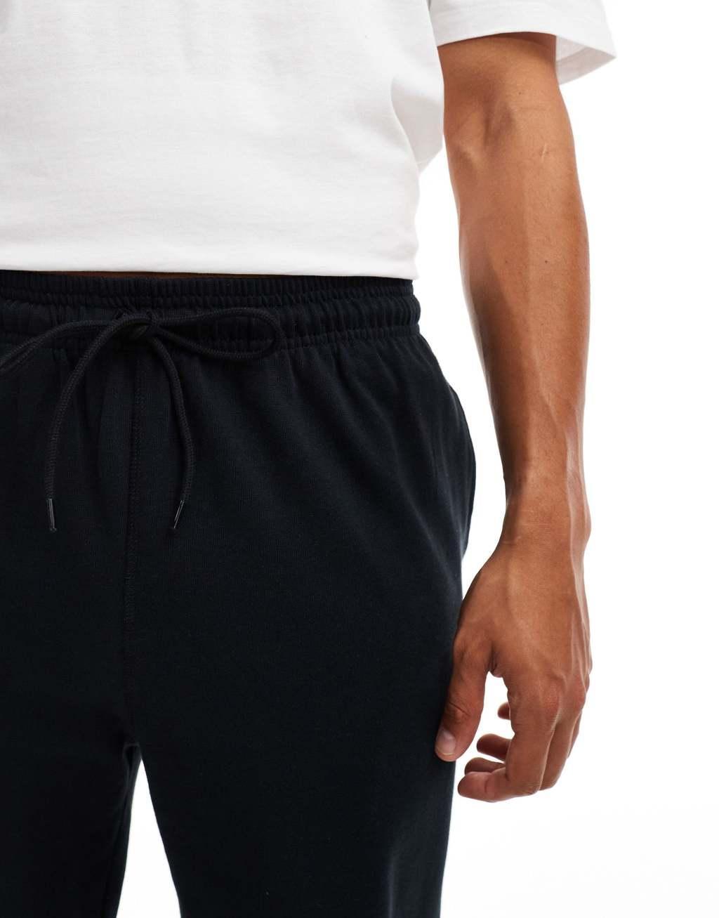 Nike Club Knit sweatpants in black Product Image