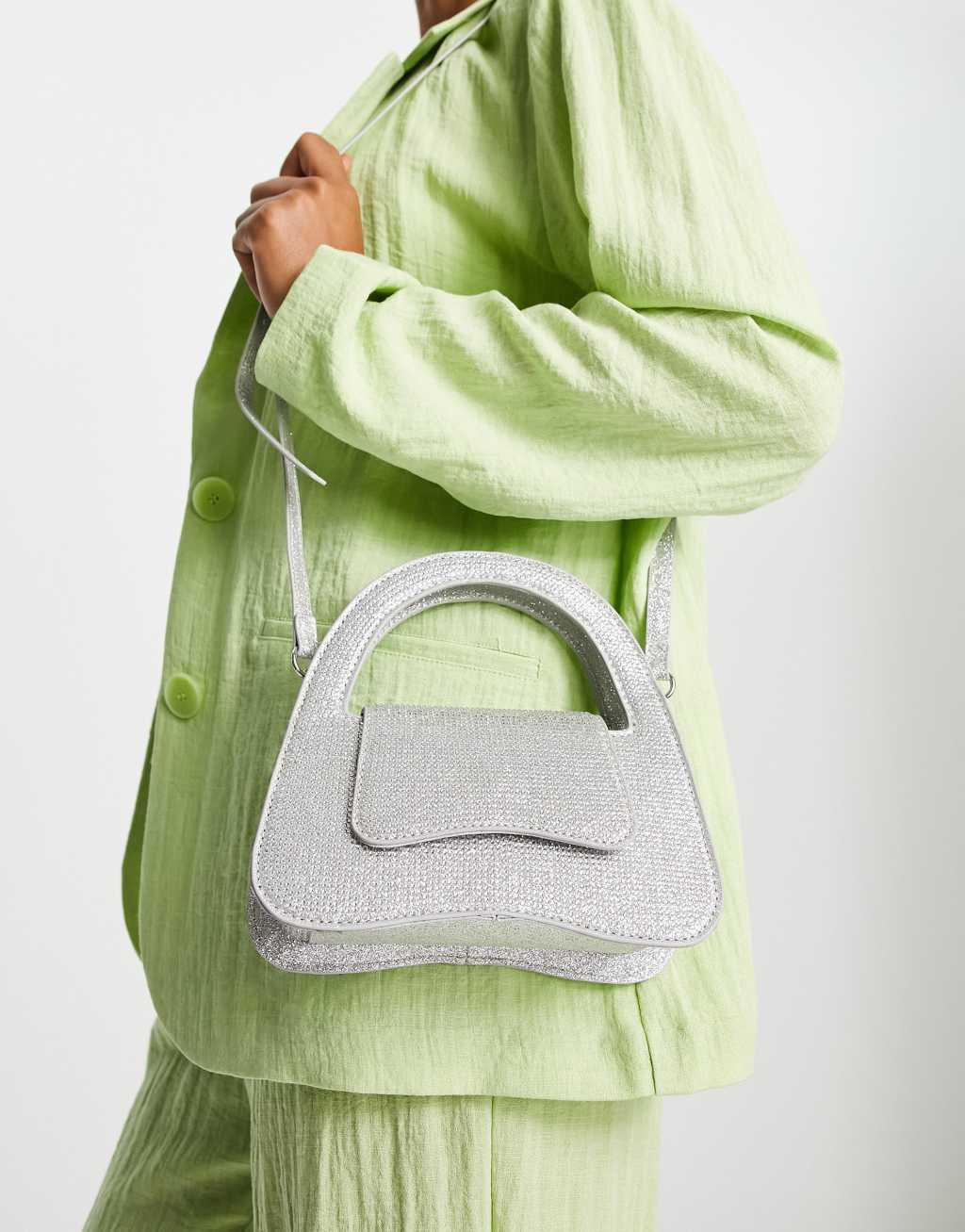 ASOS DESIGN curved clutch bag in diamante with detachable cross body strap Product Image