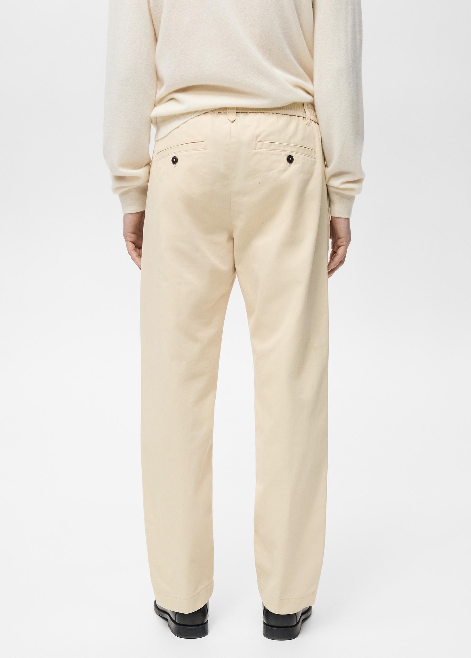 Regular-fit cotton pants with drawstring - Men | MANGO USA Product Image