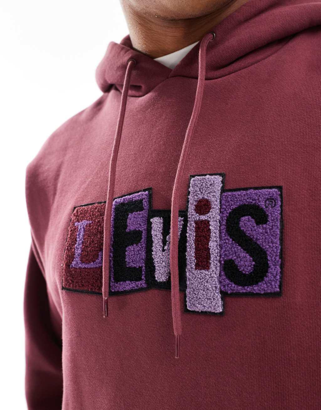 Levi's Skateboarding chenille patch logo relaxed fit hoodie in burgundy Product Image