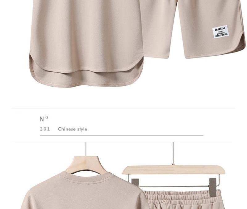 Set: Short-Sleeve Crew Neck Plain T-Shirt + Drawstring Waist Lettering Applique Sweat Shorts Product Image
