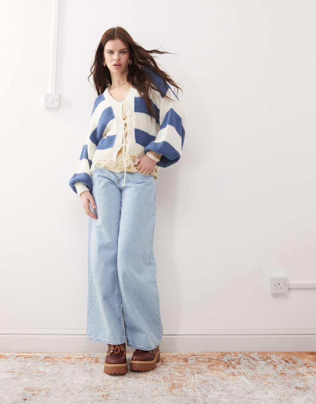 Reclaimed Vintage slouchy tie front cardigan in navy stripe Product Image