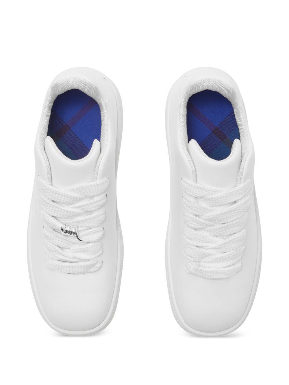 Box logo-debossed leather sneakers Product Image