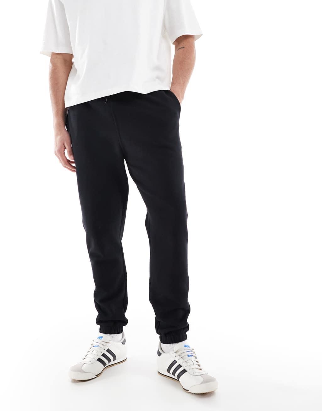 ASOS DESIGN essential skinny sweatpants in black Product Image