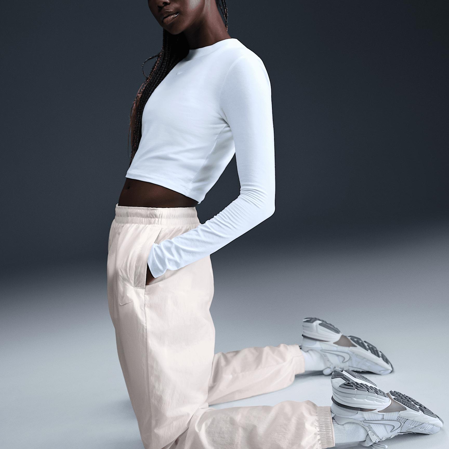 Nike Sportswear Essential Women's Mid-Rise Oversized Woven Joggers Product Image