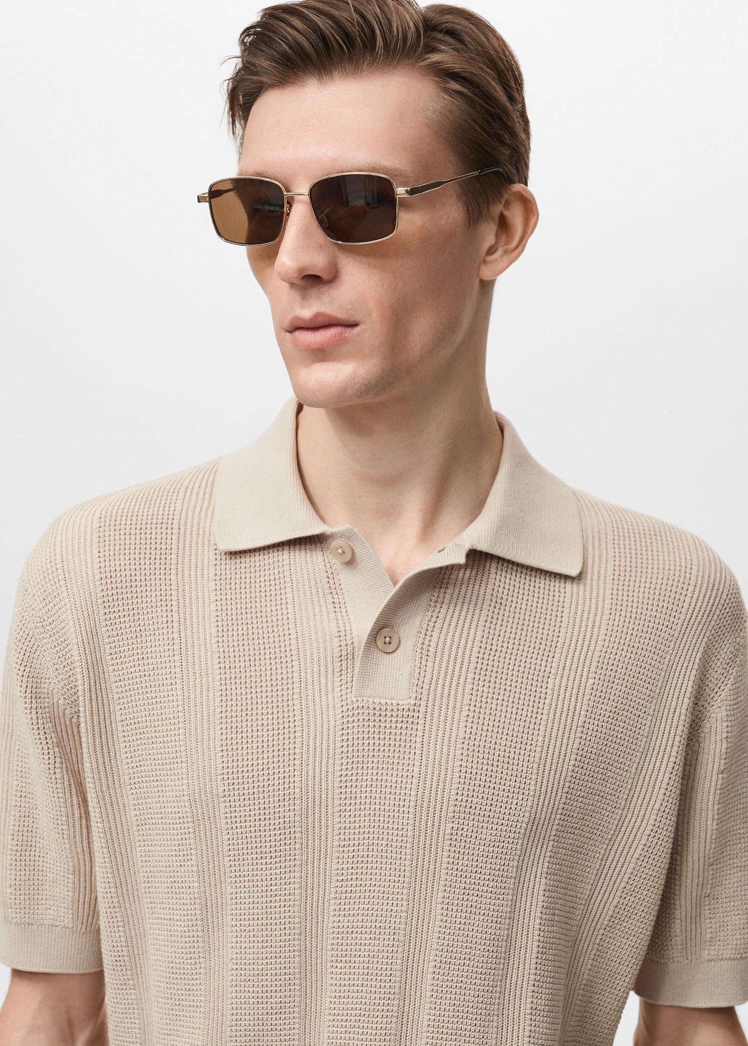 Striped openwork knitted polo shirt - Men | MANGO USA Product Image