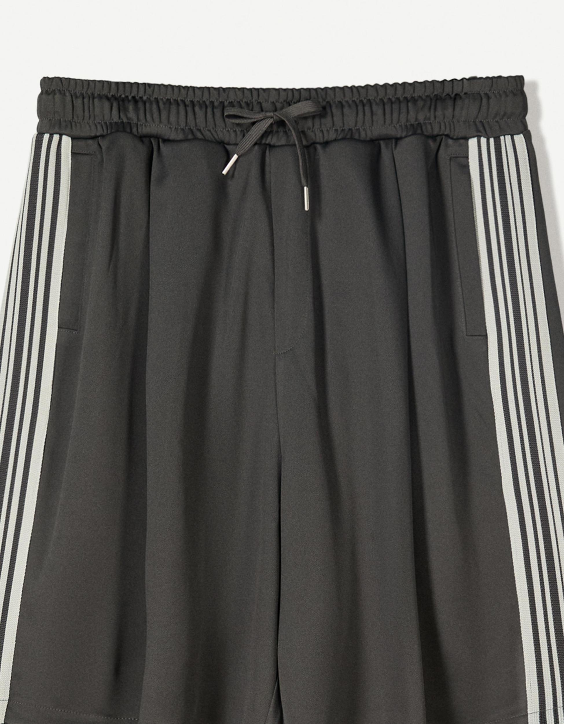 Technical Bermuda shorts with darts Product Image