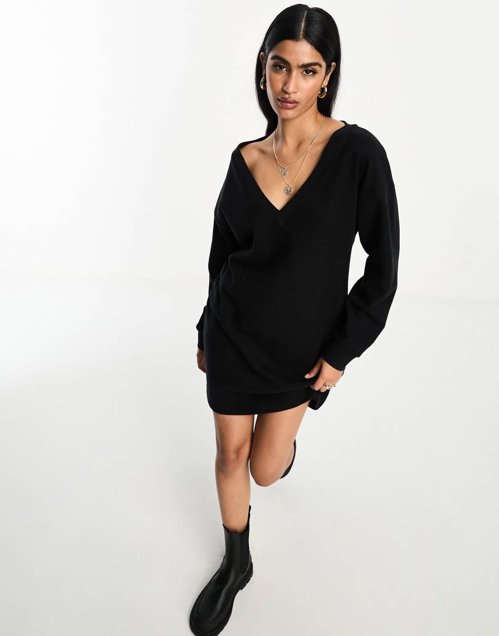 ASOS DESIGN super soft slouchy v neck sweater mini dress Product Image