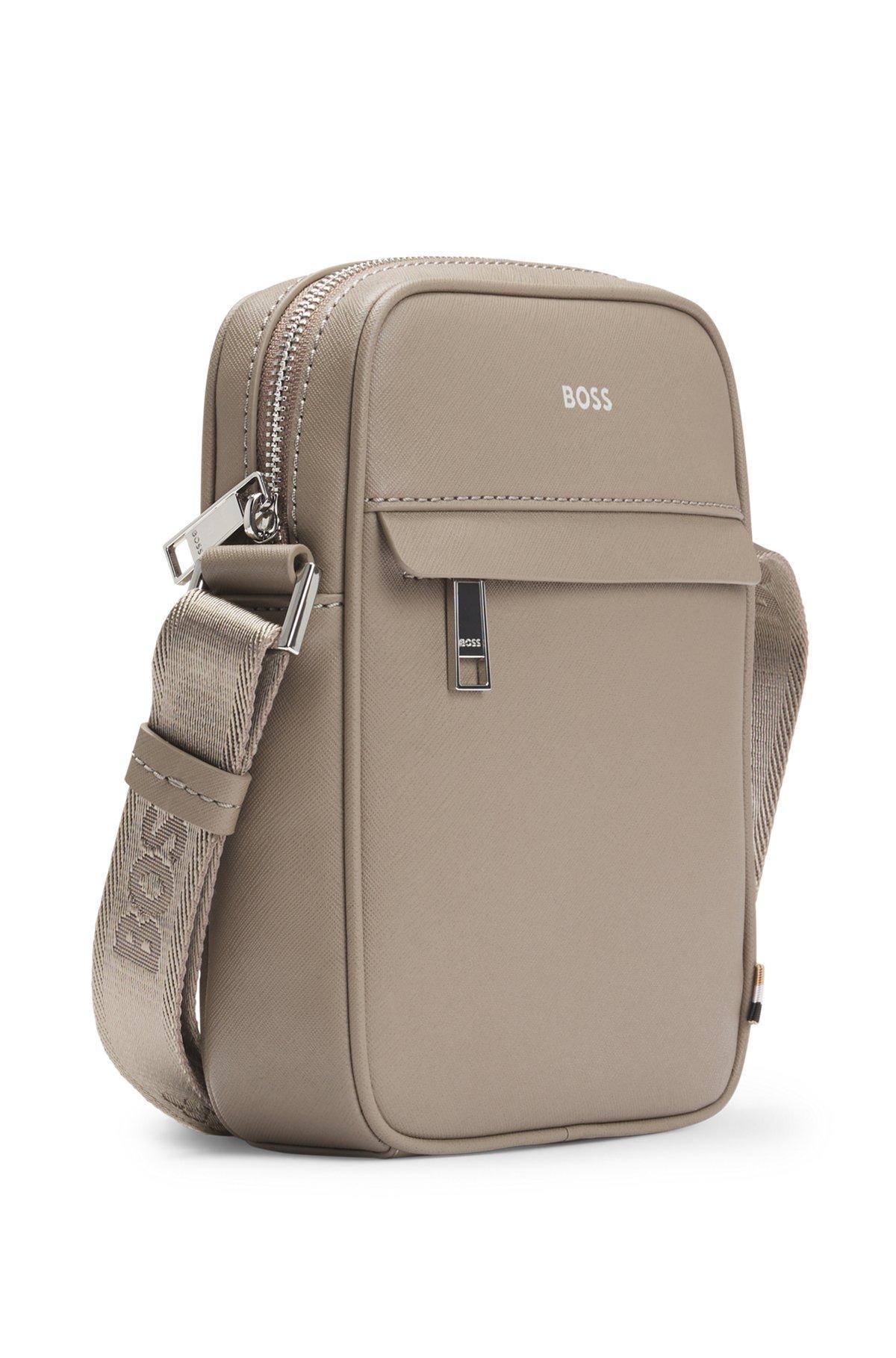 Reporter bag with signature stripe and logo detail Product Image