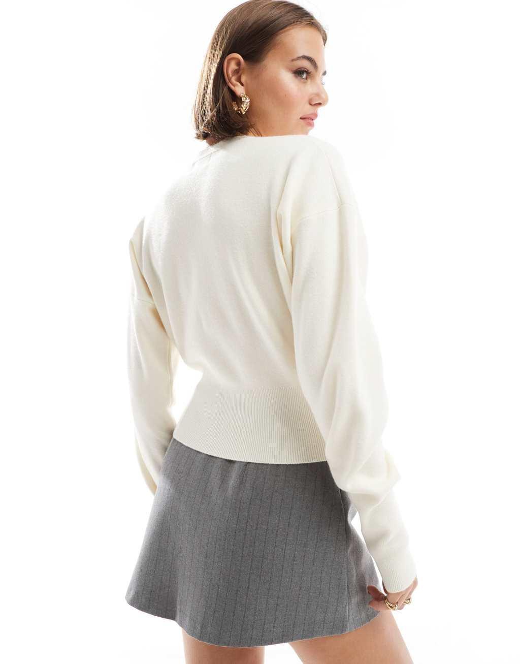 ASOS DESIGN crew neck cardigan with rib hem detail in cream Product Image