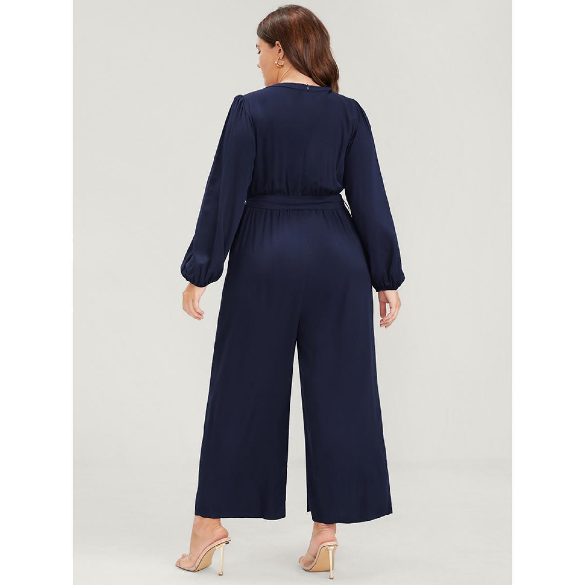 Plus Size DarkBlue Solid V Neck Lantern Sleeve Embroidered Pocket Ties Jumpsuit Women Elegant Long Sleeve V-neck Dailywear Loose Jumpsuits BloomChic 28/5X Product Image