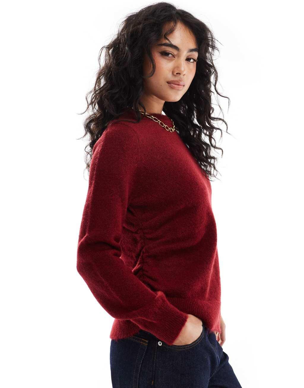 ASOS DESIGN knitted asymmetric sweater with ruched side in burgundy Product Image