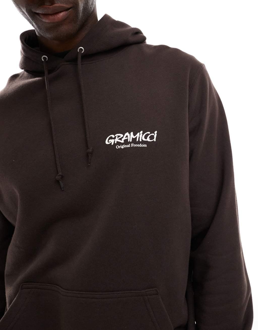 Gramicci original freedom graphic hoodie in dark brown Product Image