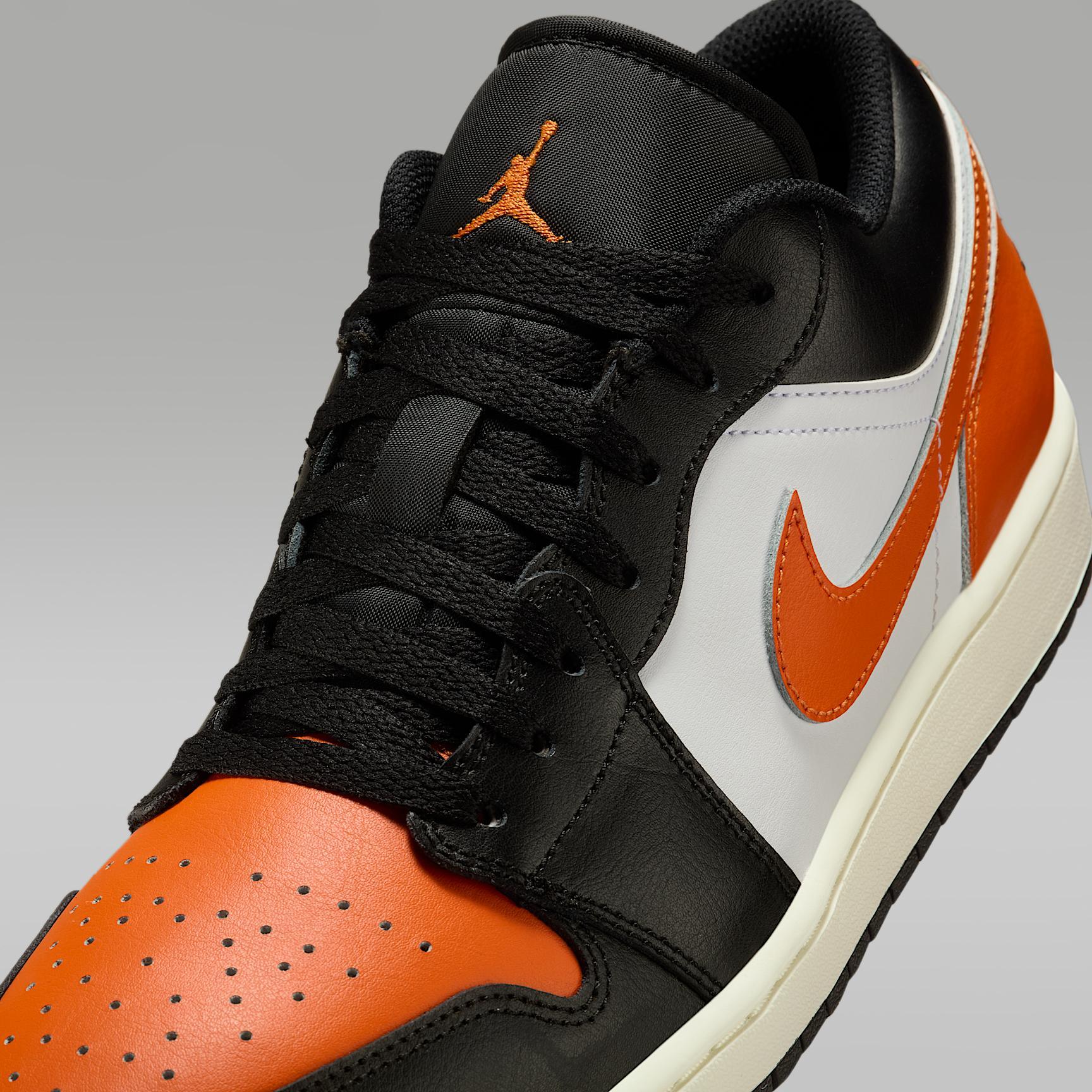 Jordan Mens Air Retro 1 Low Casual Shoes in Black/Starfish/White Product Image