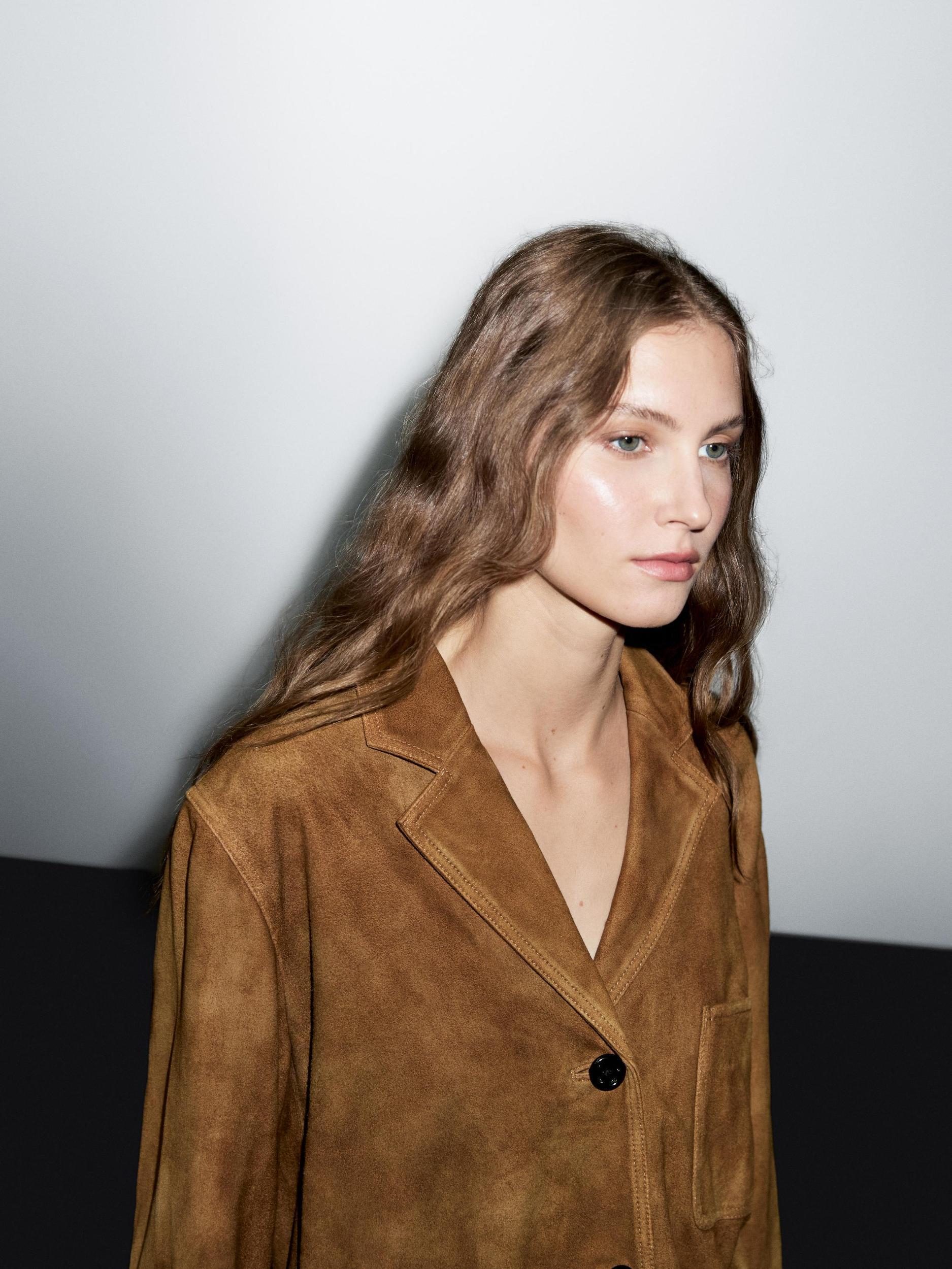 Suede leather blazer with pockets Product Image