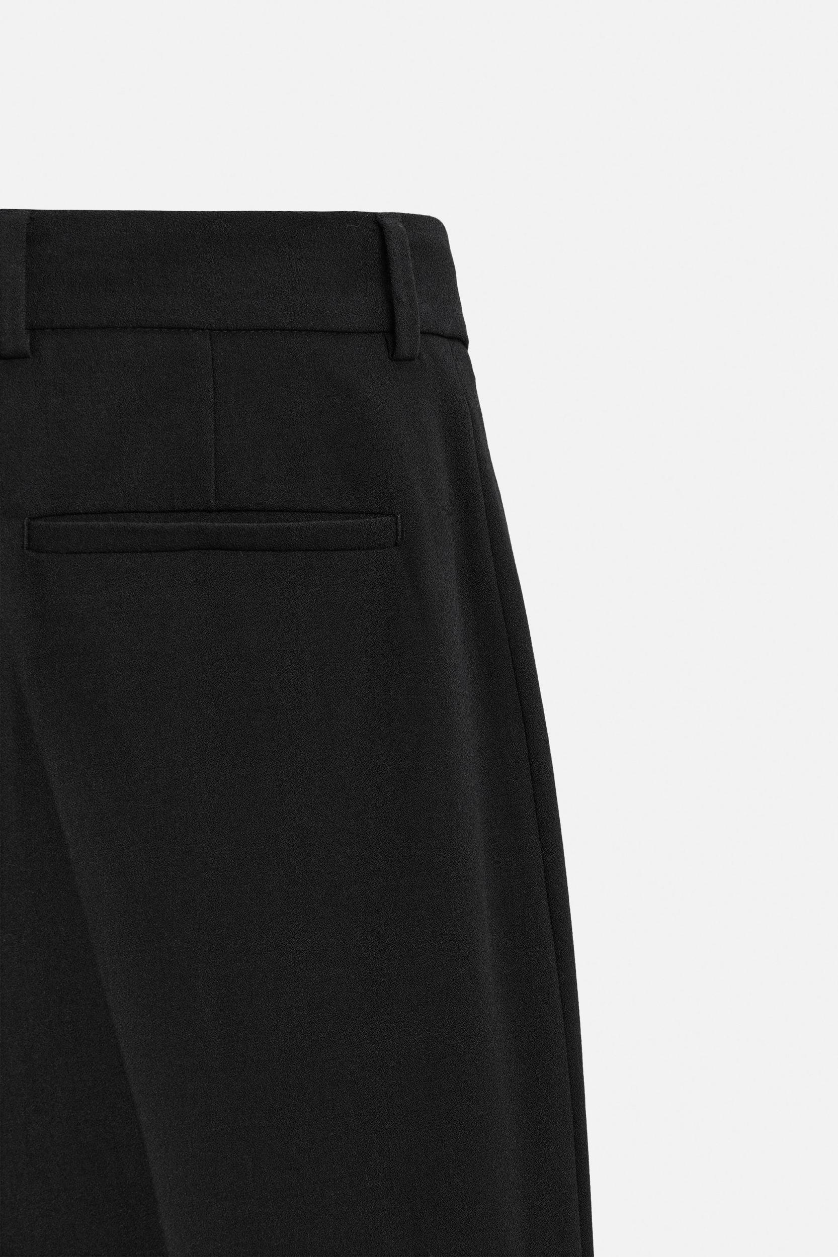 RELAXED FIT PLEATED PANTS Product Image