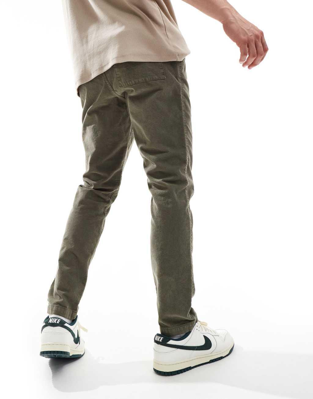 ASOS DESIGN tapered fit cord pants with elastic waist in khaki  Product Image