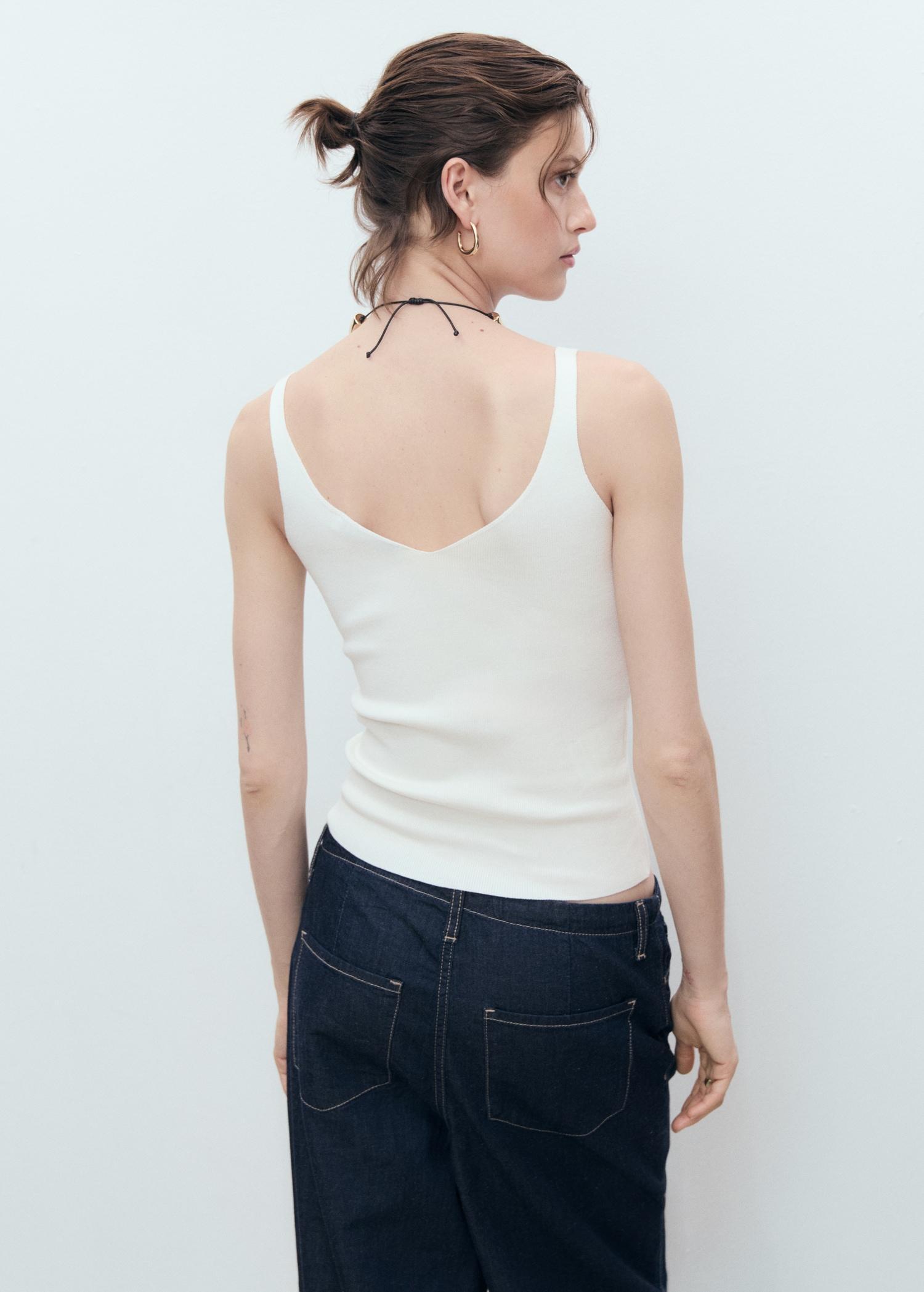 V-neck knitted top - Women | MANGO USA Product Image