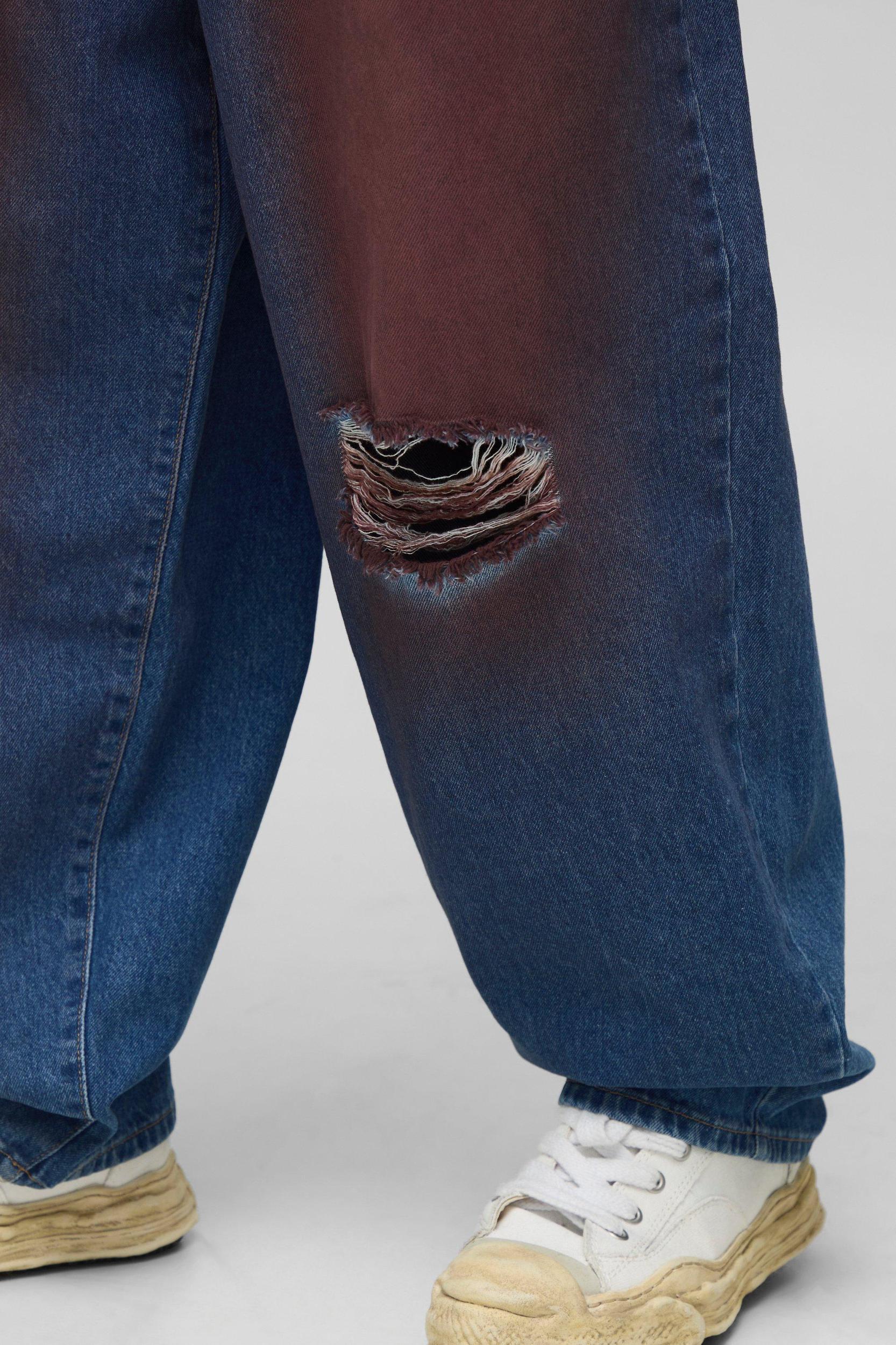 Balloon Fit Ripped Knee Red Tinted Jeans | boohooMAN USA Product Image